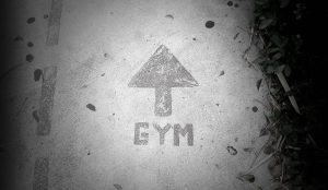 gym sign on pavement